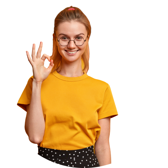 A woman in a yellow dress working on digital marketing campaigns and explainer videos.